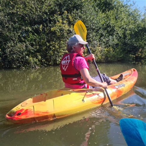 Kayaking Down the River Kayaking Down the River